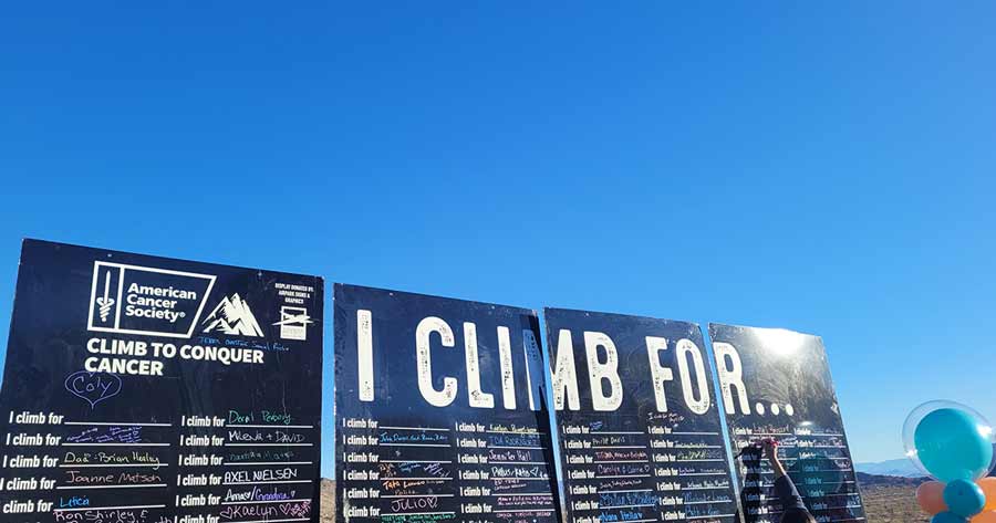 I climb for sign at the Climb to Conquer Cancer event
